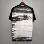 Camiseta calentamiento Real Madrid 2020/21 diseño dorsal