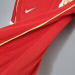 Camiseta local Retro Manchester United 2006/07 diseño lateral logo