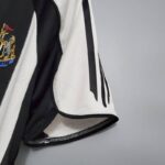 camiseta retro newcastle manga