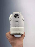 Zapatilla Air force 1 low white black diseño talón