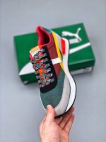 zapatilla Puma Future Rider Play amarillo marron lado interno