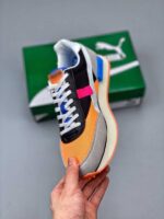 zapatilla Puma Future Rider Play negro naranja lado interno