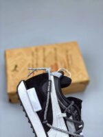 zapatilla central saint martins Future Rider negro blanco lado externo