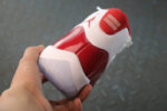 Air Jordan 11 “Cherry” talón 1