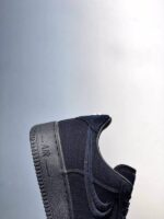NIKE AIR FORCE 1 LOW STUSSY BLACK SNEAKERS talón 1