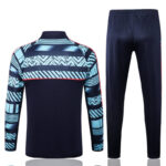 Dorso del conjunto del chándal azul oscuro del Manchester City 2022-2023