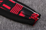 Manga de la chaqueta del chándal negro de la A.C Milan 2022-2023