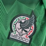Body Mexíco primera equipación 2022-2023 escudo