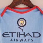 Body del Manchester City primera equipación 2022-2023 Cuello