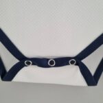 Body del Tottenham primera equipación 2022-2023 botones