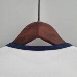 Body del Tottenham primera equipación 2022-2023 dorso del cuello