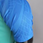 Polo FC Barcelona verde 2022-2023 manga