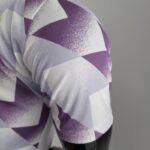 Polo Real Madrid blanco púrpura 2022-2023 manga