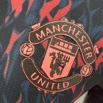 Camiseta Manchester United entrenamiento 2022-2023 - Versión jugador escudo