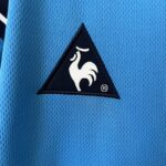 camiseta retro manchester city logo