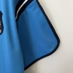 camiseta retro manchester city manga