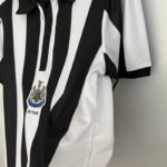 camiseta newcastle 2024 lateral