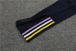 basta de pantalon de chandal del real madrid 2024