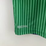 camiseta málaga 23 24 logo beecool