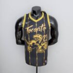 camiseta raptors negra y dorada