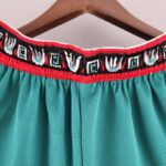 pantalon corto memphis turquesa cintura roja