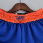 pantalon corto new york knicks azul cintura naranja y logo de los knicks
