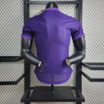 camiseta morada real madrid espalda