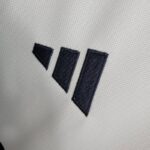 camiseta-final-champions-real-madrid-logo-rotated