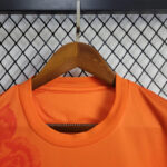 camiseta-real-madrid-naranja-cuello-redondo