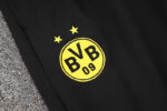 chandal-Borussia-Dortmund-amarillo-2024-2025-escudo-pantalon
