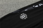 Conjunto de Buzo Manchester United Verde 2024-2025 escudo pantalon