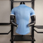 camiseta-manchester-city-primera-equipacion-2025-2026-parte-trasera}