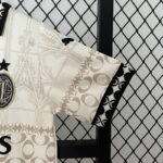 conjunto-niño-ac-milan-especial-edicion-2024-2025-puño-izquierdo