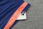 Chandal Manchester United Naranja 2024-2025 bolsillo