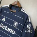 camiseta-aston-villa-tercera-equipacion-2024-2025-puño-izquierdo