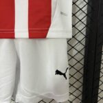 conjunto-niño-sporting-gijon-primera-equipacion-2024-2025-pretina