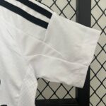 conjunto-niño-real-madrid-primera-equipacion-2024-2025-puño