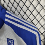 chaqueta-cortaviento-grecia-2025-2026-hombro