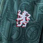 cortaviento-chelsea-verde-2025-2026-escudo