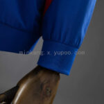 cortaviento-psg-negro-azul-2025-2026-puño