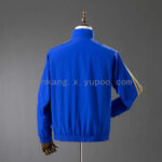 cortaviento-real-madrid-reversible-azul-y-amarillo-2025-2026-parte-trasera