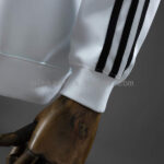 sudadera-manchester-city-manga-larga-2025-2026-puño