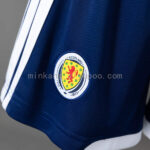 pantalon-corto-escocia-primera-equipacion-mundial-2026-escudo