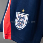 pantalon-corto-inglaterra-primera-equipacion-mundial-2026-escudo