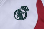 chandal-real-madrid-cremallera-corta-2026-2027-escudo